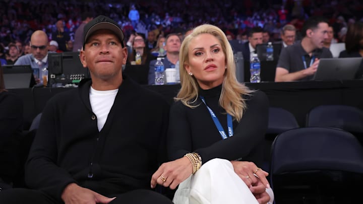 Mar 15, 2025; New York, NY, USA; New York Yankees former player Alex Rodriguez and his girlfriend Jaclyn Cordeiro sit court side during the first half between the St. John's Red Storm and the Creighton Bluejays at Madison Square Garden. Mandatory Credit: Brad Penner-Imagn Images