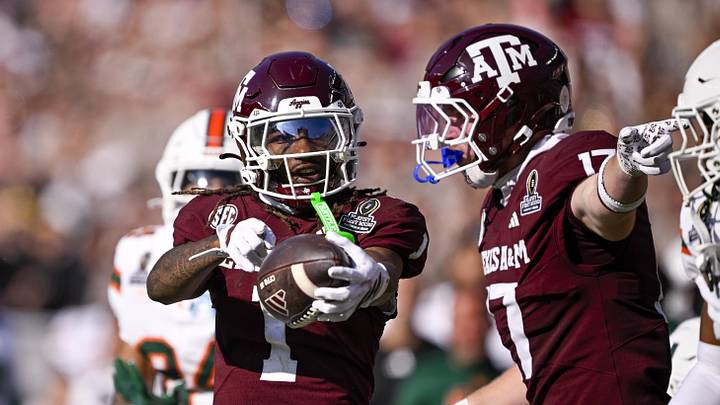 Dec 20, 2025; College Station, TX, USA; Texas A&M Aggies wide receiver Mario Craver (1) and tight end Theo Melin Ohrstrom (17) celebrate during the game between the Aggies and the Hurricanes at Kyle Field. Mandatory Credit: Jerome Miron-Imagn Images