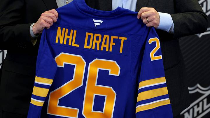 Jan 12, 2026; Buffalo, New York, USA;  NHL Commissioner Gary Bettman and Buffalo Sabres owner Terry Pegula pose for a photo during a press conference announcing the 2026 NHL Draft taking place in Buffalo at KeyBank Center. Mandatory Credit: Timothy T. Ludwig-Imagn Images