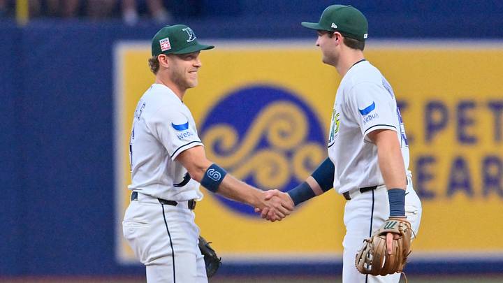 Jul 25, 2026; St. Petersburg, Florida, USA; Tampa Bay Rays short stop Taylor Walls (6) shakes hands with second baseman Ben Williamson (15) at the end of a game against Cleveland Guardians at Tropicana Field. Mandatory Credit: Pablo Robles-Imagn Images