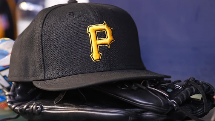 Sep 8, 2023; Atlanta, Georgia, USA; A detailed view of a Pittsburgh Pirates hat and glove before a game against the Pittsburgh Pirates in the first inning at Truist Park. Mandatory Credit: Brett Davis-Imagn Images Sep 8, 2023; Atlanta, Georgia, USA; A detailed view of a Pittsburgh Pirates hat and glove before a game against the Pittsburgh Pirates in the first inning at Truist Park. Mandatory Credit: Brett Davis-Imagn Images