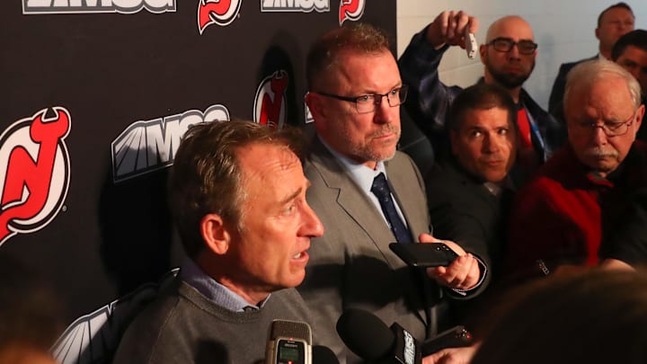 Jan 12, 2020; Newark, New Jersey, USA; New Jersey Devils owner Joshua Harris speaks to the media alongside interim general manager Tom Fitzgerald after the Devils and former general manager Ray Shero reached an agreement to part ways prior to the start of the NHL game between the New Jersey Devils and the Tampa Bay Lightning at Prudential Center. Mandatory Credit: Ed Mulholland-Imagn Images Jan 12, 2020; Newark, New Jersey, USA; New Jersey Devils owner Joshua Harris speaks to the media alongside interim general manager Tom Fitzgerald after the Devils and former general manager Ray Shero reached an agreement to part ways prior to the start of the NHL game between the New Jersey Devils and the Tampa Bay Lightning at Prudential Center. Mandatory Credit: Ed Mulholland-Imagn Images