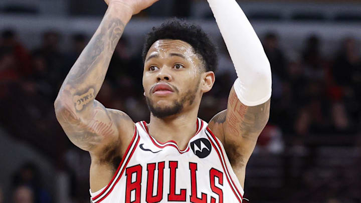 Feb 19, 2026; Chicago, Illinois, USA; Chicago Bulls guard Anfernee Simons (22) shoots against the Toronto Raptors during the second half at United Center. Mandatory Credit: Kamil Krzaczynski-Imagn Images