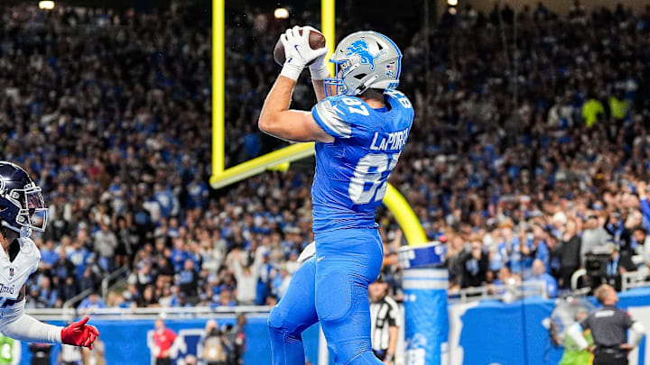 Detroit Lions tight end Sam LaPorta (87) makes a catch in the end zone for a touchdown against Tennessee Titans during the first half at Ford Field in Detroit on Sunday, Oct. 27, 2024. Detroit Lions tight end Sam LaPorta (87) makes a catch in the end zone for a touchdown against Tennessee Titans during the first half at Ford Field in Detroit on Sunday, Oct. 27, 2024.