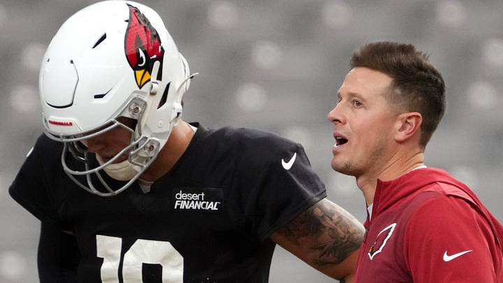 Arizona Cardinals head coach Mike LaFleur talks to quarterback Carson Beck (19) during training camp at State Farm Stadium in Glendale on Aug 2, 2026. Arizona Cardinals head coach Mike LaFleur talks to quarterback Carson Beck (19) during training camp at State Farm Stadium in Glendale on Aug 2, 2026.