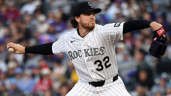 Colorado Rockies pitcher Chase Dollander (32) pitches against the Philadelphia Phillies at Coors Field. Colorado Rockies pitcher Chase Dollander (32) pitches against the Philadelphia Phillies at Coors Field.