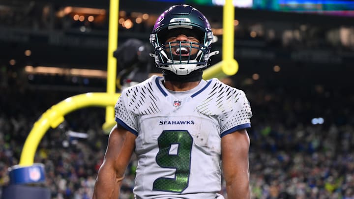 Dec 18, 2025; Seattle, Washington, USA; Seattle Seahawks running back Kenneth Walker III (9) celebrates after scoring a touchdown against the Los Angeles Rams in the second half at Lumen Field. Mandatory Credit: Steven Bisig-Imagn Images