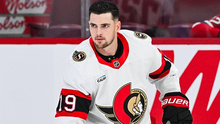 Oct 12, 2024; Montreal, Quebec, CAN; Ottawa Senators right wing Drake Batherson (19) stretches during warm-up before the game against the Montreal Canadiens at Bell Centre. Mandatory Credit: David Kirouac-Imagn Images