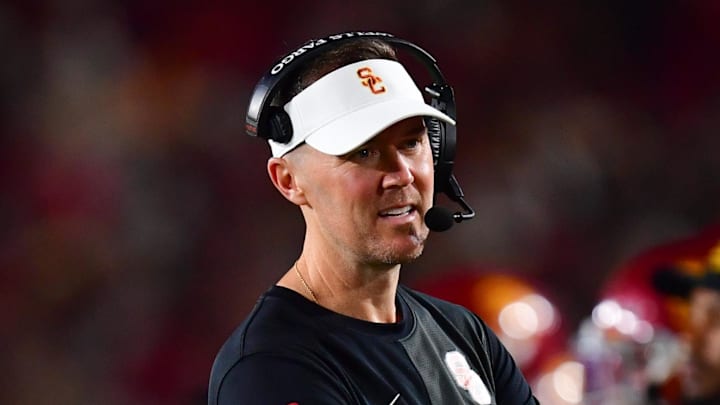 Sep 20, 2025; Los Angeles, California, USA; Southern California Trojans head coach Lincoln Riley speaks with the official during the second half at the Los Angeles Memorial Coliseum. Mandatory Credit: Gary A. Vasquez-Imagn Images