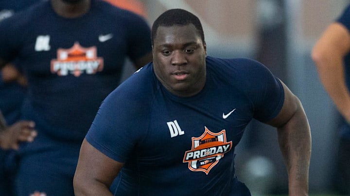 Auburn Tigers defensive lineman Bobby Jamison-Travis (97) runs drills during Auburn football pro day at Woltosz Performance Center in Auburn, Ala. on Tuesday, March 24, 2026.
