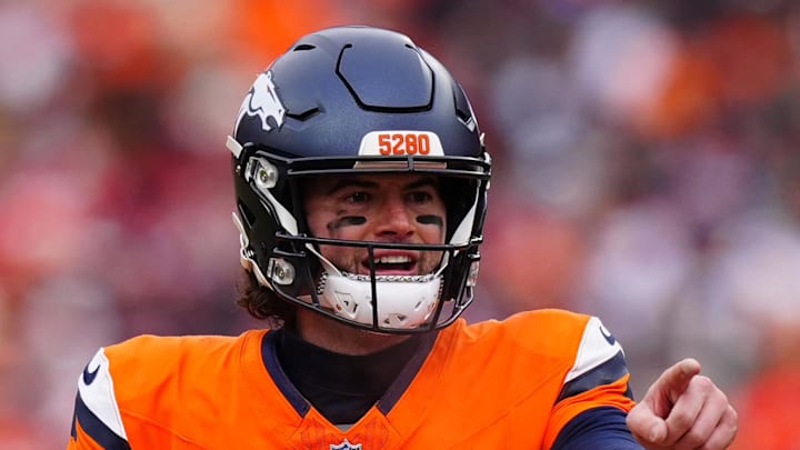 Jan 25, 2026; Denver, CO, USA; Denver Broncos quarterback Jarrett Stidham (8) reacts during the first half in the 2026 AFC Championship Game at Empower Field at Mile High. Mandatory Credit: Ron Chenoy-Imagn Images