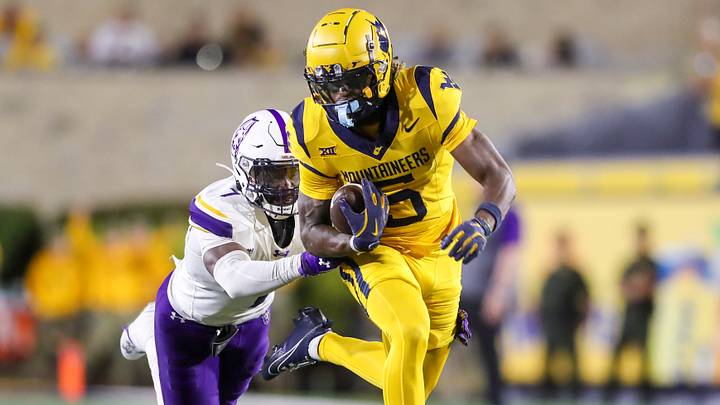 Sep 7, 2024; Morgantown, West Virginia, USA; West Virginia Mountaineers wide receiver Jaden Bray (5) catches a pass and runs for extra yards during the third quarter against the Albany Great Danes at Mountaineer Field at Milan Puskar Stadium. Mandatory Credit: Ben Queen-Imagn Images Sep 7, 2024; Morgantown, West Virginia, USA; West Virginia Mountaineers wide receiver Jaden Bray (5) catches a pass and runs for extra yards during the third quarter against the Albany Great Danes at Mountaineer Field at Milan Puskar Stadium. Mandatory Credit: Ben Queen-Imagn Images
