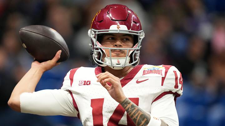 Dec 30, 2025; San Antonio, TX, USA; Southern California Trojans quarterback Jayden Maiava (14) throws the ball against the TCU Horned Frogs in the first half during the Alamo Bowl at Alamodome. Mandatory Credit: Kirby Lee-Imagn Images