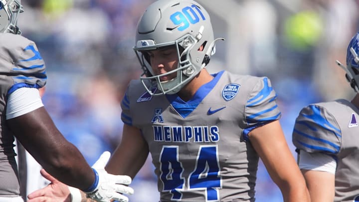 Memphis' Gianni Spetic (44) celebrates with Chris Adams (61) after making an extra point during the season opener between Chattanooga and Memphis at Simmons Bank Liberty Stadium in Memphis, Tenn., on August 30, 2025. Memphis' Gianni Spetic (44) celebrates with Chris Adams (61) after making an extra point during the season opener between Chattanooga and Memphis at Simmons Bank Liberty Stadium in Memphis, Tenn., on August 30, 2025.