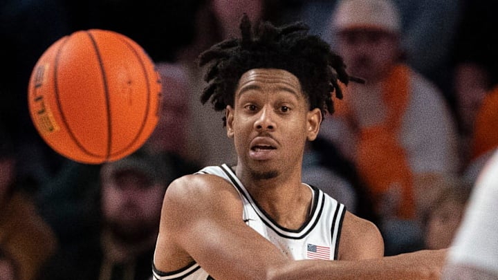Vanderbilt Commodores guard AJ Hoggard (11) makes a pass against the Tennessee Volunteers during their game at Memorial Gym in Nashville, Tenn., Saturday, Jan. 18, 2025.