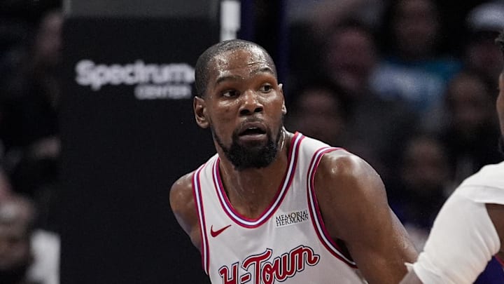 Feb 19, 2026; Charlotte, North Carolina, USA; Houston Rockets forward Kevin Durant (7) brings the ball up court defended by Charlotte Hornets forward Brandon Miller (24) during the second half at Spectrum Center. Mandatory Credit: Jim Dedmon-Imagn Images