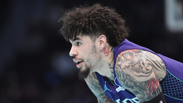 Nov 26, 2025; Charlotte, North Carolina, USA; Charlotte Hornets guard LaMelo Ball (1) in a time out during the first half against the New York Knicks at the Spectrum Center. Nov 26, 2025; Charlotte, North Carolina, USA; Charlotte Hornets guard LaMelo Ball (1) in a time out during the first half against the New York Knicks at the Spectrum Center.