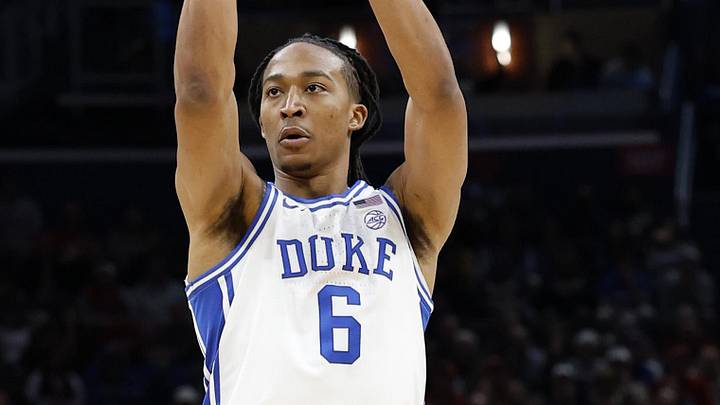 Mar 27, 2026; Washington, DC, USA; Duke Blue Devils forward Maliq Brown (6) shoots the ball against St. John's Red Storm forward Zuby Ejiofor (24) in the first half during a Sweet Sixteen game of the East Regional of the men's 2026 NCAA Tournament at Capital One Arena. Mandatory Credit: Amber Searls-Imagn Images