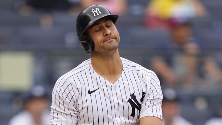 Jul 17, 2022; Bronx, New York, USA; New York Yankees right fielder Joey Gallo (13) reacts to hitting a fly ball out during the eighth inning against the Boston Red Sox at Yankee Stadium.