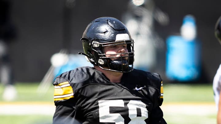 Apr 26, 2025; Iowa City, IA, USA; Iowa offensive lineman Kade Pieper looks to the sideline during a spring NCAA football open practice at Kinnick Stadium. Mandatory Credit: Joseph Cress/For the Register