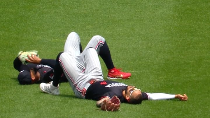 Byron Buxton and Carlos Correa after a scary collision in the third inning on Thursday. Byron Buxton and Carlos Correa after a scary collision in the third inning on Thursday.