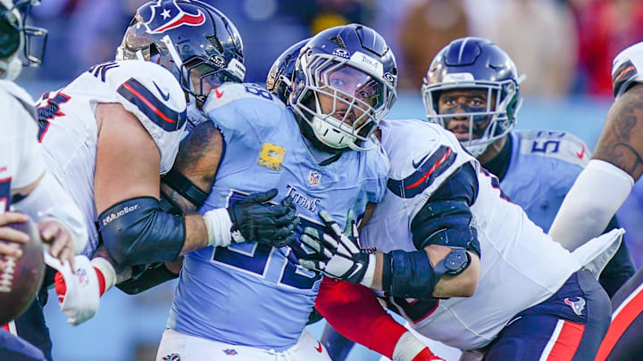 Tennessee Titans defensive tackle Jeffery Simmons (98) applies pressure to Houston Texans quarterback Davis Mills (10) during the fourth quarter at Nissan Stadium in Nashville, Tenn., Sunday, Nov. 16, 2025.
