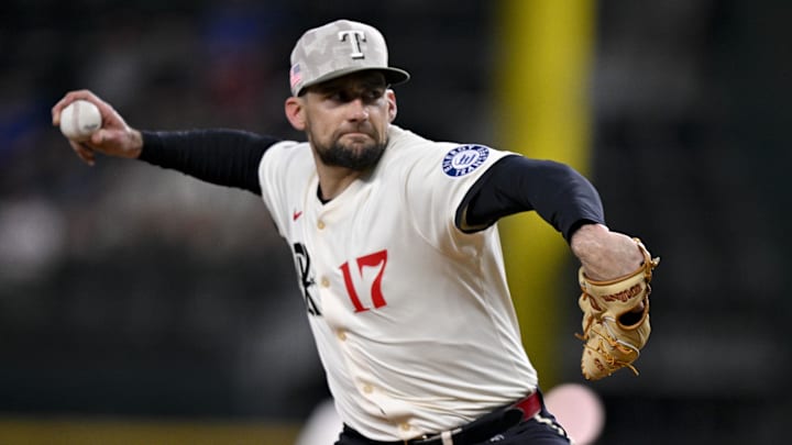 May 16, 2025; Arlington, Texas, USA; Texas Rangers starting pitcher Nathan Eovaldi (17) pitches against the Houston Astros during the first inning at Globe Life Field.