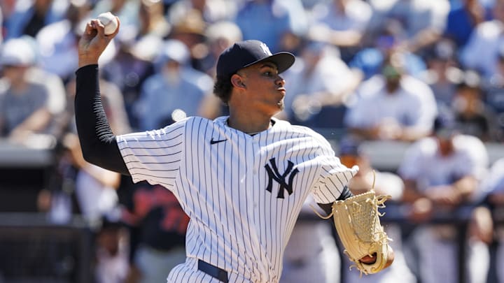 Feb 21, 2026; Tampa, Florida, USA; New York Yankees pitcher Carlos Lagrange (84) throws a pitch against the Detroit Tigers during the second inning in a Spring Training game at George M. Steinbrenner Field. Mandatory Credit: Morgan Tencza-Imagn Images