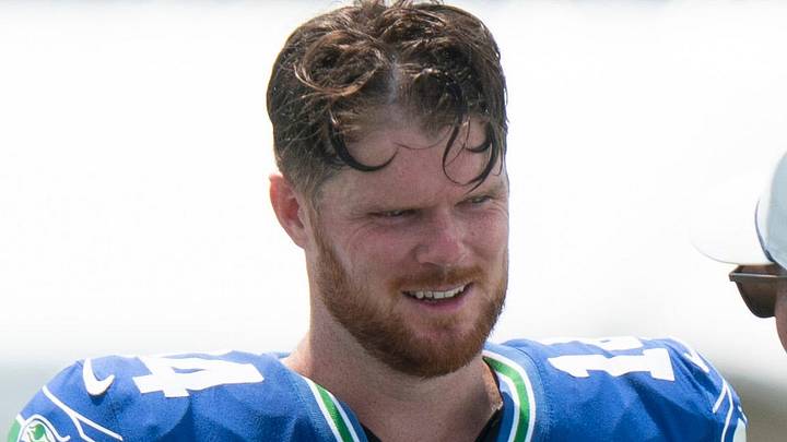 Seattle Seahawks quarterback Sam Darnold talks with fans