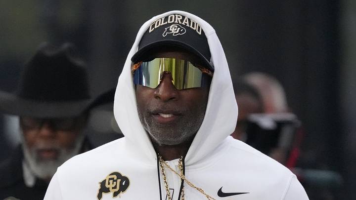 Sep 19, 2026; Evanston, Illinois, USA;  Colorado Buffaloes head coach Deion Sanders takes the field with his team for warmups before the game against the Northwestern Wildcats at Northwestern Medicine Field at Martin Stadium.  Mandatory Credit: David Banks-Imagn Images