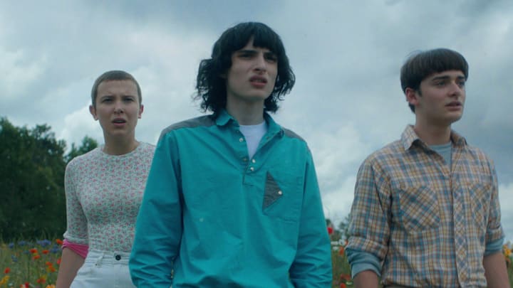 STRANGER THINGS. (L to R) Millie Bobby Brown as Eleven, Finn Wolfhard as Mike Wheeler and Noah Schnapp as Will Byers in STRANGER THINGS. Cr. Courtesy of Netflix © 2022