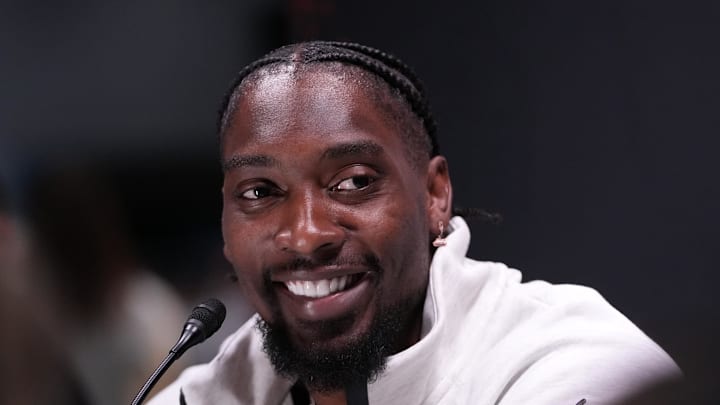 Seattle Seahawks defensive end DeMarcus Lawrence speaks to the media