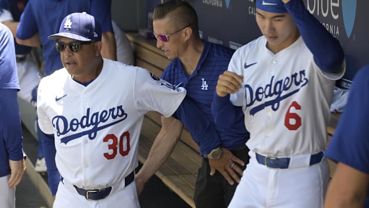 Dodgers manager Dave Roberts (30) in the dugout prior to the game against the Houston Astros at Dodger Stadium on Sunday.