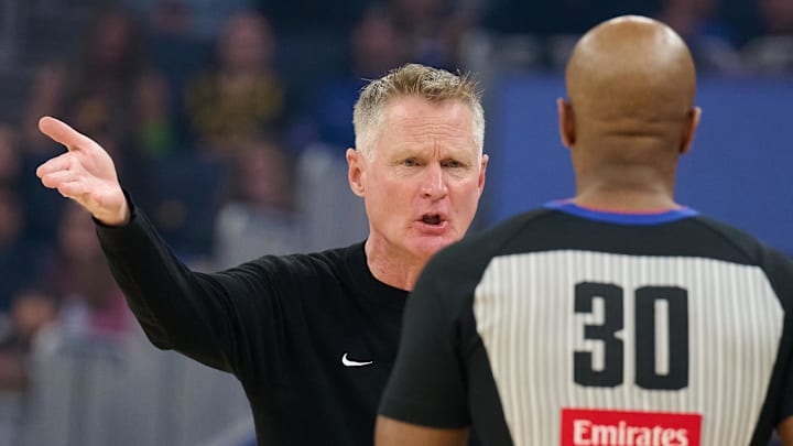 Jan 7, 2026; San Francisco, California, USA; Golden State Warriors head coach Steve Kerr reacts to a call by referee John Butler (30) against the Milwaukee Bucks during the first quarter at Chase Center. Mandatory Credit: Robert Edwards-Imagn Images
