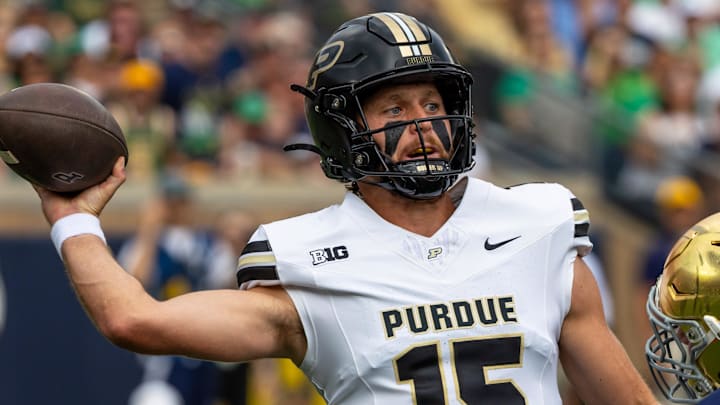 Purdue Boilermakers quarterback Ryan Browne (15) throws a pass 