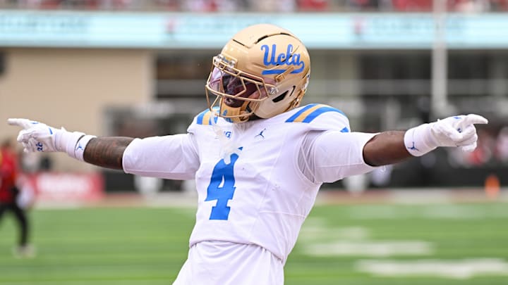 Oct 25, 2025; Bloomington, Indiana, USA; UCLA Bruins defensive back Key Lawrence (4) celebrates after a play during the first half against the Indiana Hoosiers at Memorial Stadium. Mandatory Credit: Robert Goddin-Imagn Images