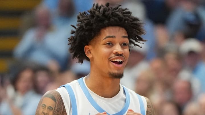 Dec 7, 2025; Chapel Hill, North Carolina, USA; North Carolina Tar Heels forward Jonathan Powell (11) reacts after hitting a three point shot in the second half at Dean E. Smith Center. Mandatory Credit: Bob Donnan-Imagn Images Dec 7, 2025; Chapel Hill, North Carolina, USA; North Carolina Tar Heels forward Jonathan Powell (11) reacts after hitting a three point shot in the second half at Dean E. Smith Center. Mandatory Credit: Bob Donnan-Imagn Images