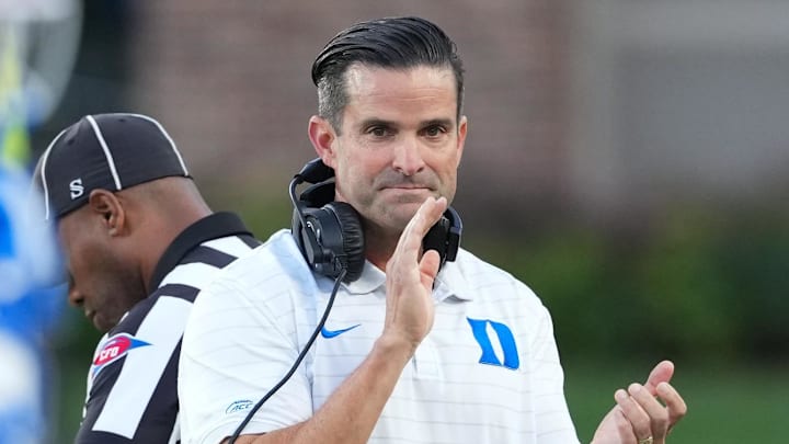 Aug 28, 2025; Durham, North Carolina, USA;  Duke Blue Devils head coach Manny Diaz reacts during the warmups before the game against the Elon Phoenix at Wallace Wade Stadium. Mandatory Credit: James Guillory-Imagn Images