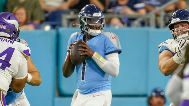 Tennessee Titans quarterback Cam Ward (1) looks for a receiver during the first quarter of an NFL pre-season game against the Minnesota Vikings at Nissan Stadium in Nashville, Tenn., Friday, Aug. 22, 2025.