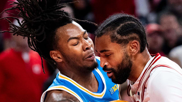 Jan 4, 2025; Lincoln, Nebraska, USA; Nebraska Cornhuskers guard Brice Williams (3) loses the ball against UCLA Bruins guard Sebastian Mack (12) and guard Skyy Clark (55) during the first half at Pinnacle Bank Arena. Mandatory Credit: Dylan Widger-Imagn Images Jan 4, 2025; Lincoln, Nebraska, USA; Nebraska Cornhuskers guard Brice Williams (3) loses the ball against UCLA Bruins guard Sebastian Mack (12) and guard Skyy Clark (55) during the first half at Pinnacle Bank Arena. Mandatory Credit: Dylan Widger-Imagn Images