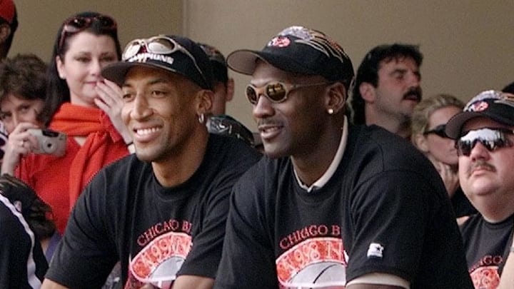 June 16, 1998; Chicago, IL, USA; Chicago Bulls with their six championship trophies. Left to right in the front row are Luc Longley, Toni Kukoc, Ron Harper, Dennis Rodman (leaning back), Scottie Pippen, Michael Jordan and Chicago Mayor Richard Daley at a championship rally at Grant Park in Chicago.   Mandatory Credit: Anne Ryan-USA TODAY