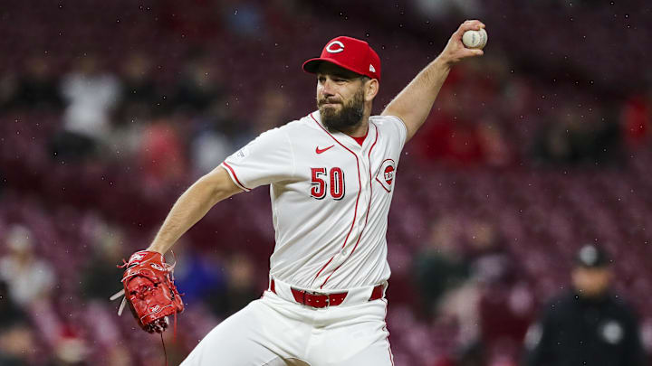 Apr 23, 2024; Cincinnati, Ohio, USA; Cincinnati Reds relief pitcher Sam Moll (50) pitches against the Philadelphia Phillies in the ninth inning at Great American Ball Park. Mandatory Credit: Katie Stratman-Imagn Images