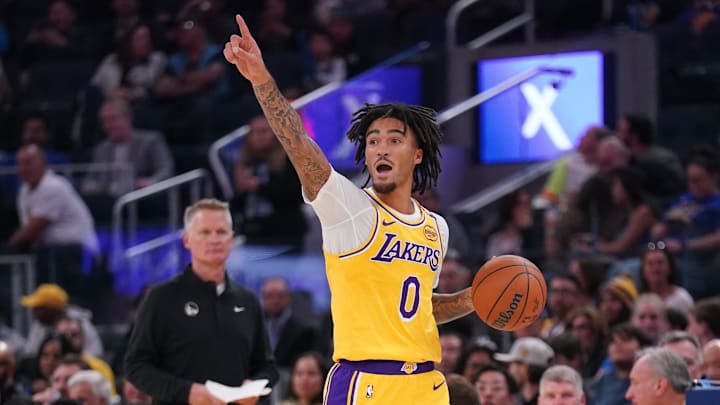 Los Angeles Lakers guard Jalen Hood-Schifino (0) calls a play against the Golden State Warriors at the Chase Center. Los Angeles Lakers guard Jalen Hood-Schifino (0) calls a play against the Golden State Warriors at the Chase Center.
