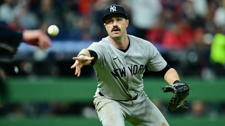 Oct 17, 2024; Cleveland, Ohio, USA; New York Yankees third baseman Jon Berti (19) tosses to first during the sixth inning against the Cleveland Guardians in game 3 of the American League Championship Series at Progressive Field. Mandatory Credit: David Dermer-Imagn Images Oct 17, 2024; Cleveland, Ohio, USA; New York Yankees third baseman Jon Berti (19) tosses to first during the sixth inning against the Cleveland Guardians in game 3 of the American League Championship Series at Progressive Field. Mandatory Credit: David Dermer-Imagn Images