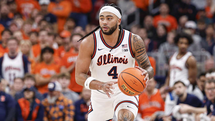 Nov 19, 2025; Chicago, Illinois, USA; Illinois Fighting Illini guard Kylan Boswell (4) brings the ball up court against the Alabama Crimson Tide during the first half at United Center. Mandatory Credit: Kamil Krzaczynski-Imagn Images