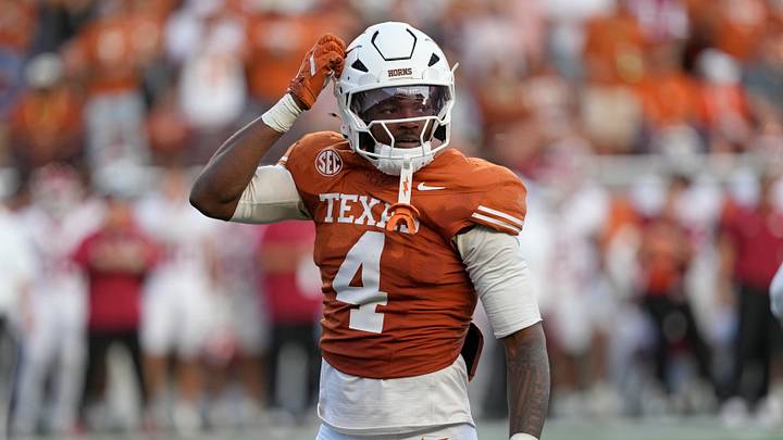 Texas Longhorns defensive back Jelani McDonald (4) scratches his helmet after making a tackle during the second half against the Arkansas Razorbacks at Darrell K Royal-Texas Memorial Stadium. Texas Longhorns defensive back Jelani McDonald (4) scratches his helmet after making a tackle during the second half against the Arkansas Razorbacks at Darrell K Royal-Texas Memorial Stadium.