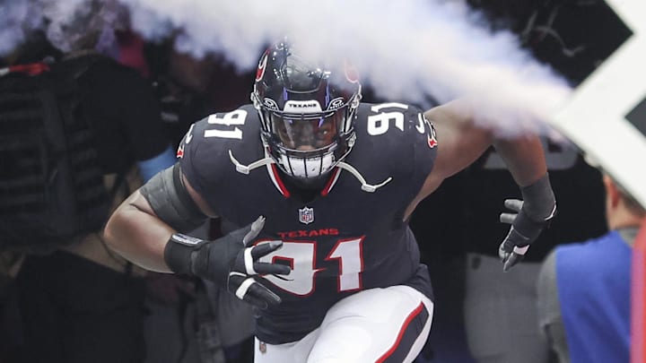 Oct 27, 2024; Houston, Texas, USA; Houston Texans defensive tackle Folorunso Fatukasi (91) runs onto the field before the game against the Indianapolis Colts at NRG Stadium. Mandatory Credit: Troy Taormina-Imagn Images