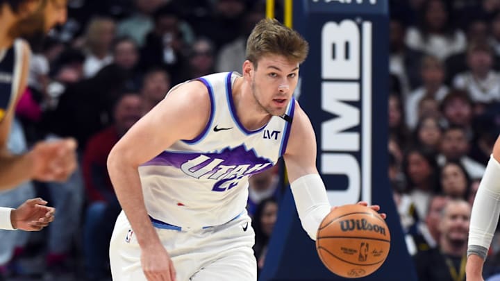 Mar 27, 2026; Denver, Colorado, USA; Utah Jazz forward Kyle Filipowski (22) moves the ball up the floor during the first half against the Denver Nuggets at Ball Arena. Mandatory Credit: Christopher Hanewinckel-Imagn Images Mar 27, 2026; Denver, Colorado, USA; Utah Jazz forward Kyle Filipowski (22) moves the ball up the floor during the first half against the Denver Nuggets at Ball Arena. Mandatory Credit: Christopher Hanewinckel-Imagn Images