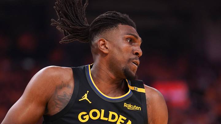 May 12, 2025; San Francisco, California, USA; Golden State Warriors forward Kevon Looney (5) holds onto a rebound against the Minnesota Timberwolves in the first quarter during game four of the second round for the 2025 NBA Playoffs at Chase Center. Mandatory Credit: Cary Edmondson-Imagn Images