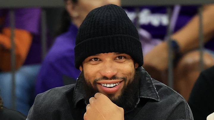 Phoenix Suns forward Dillon Brooks smiles as he sits courtside at the Phoenix Mercury game against the Minnesota Lynx in the second half at Mortgage Matchup Center on May 12, 2026. Phoenix Suns forward Dillon Brooks smiles as he sits courtside at the Phoenix Mercury game against the Minnesota Lynx in the second half at Mortgage Matchup Center on May 12, 2026.